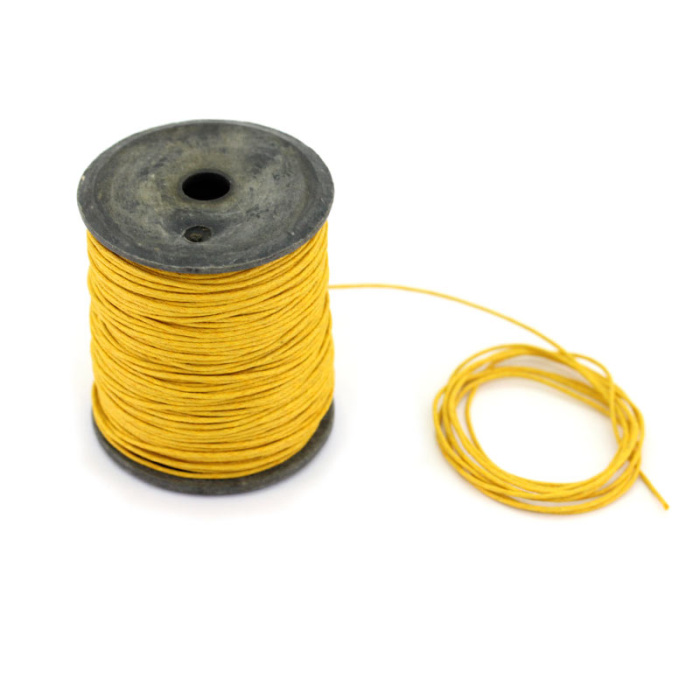 Hilo encerado mostaza 100 metros espesor 0,8 mm