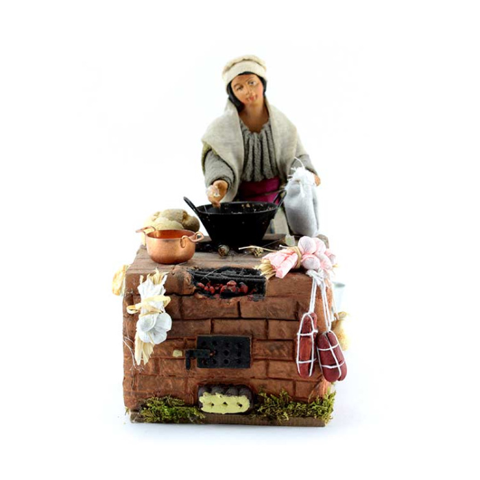 Mujer cocinando en terracota con traje 12 cm Mujer cocinando en terracota con traje 12 cm