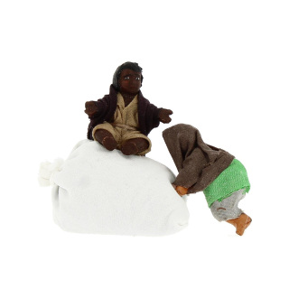 Boy sitting on sack and crawling boy in dressed terracotta 10 cm