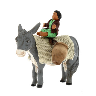 Boy on donkey in dressed terracotta 10 cm