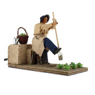 Hombre con pala en movimiento de terracota con traje 12 cm