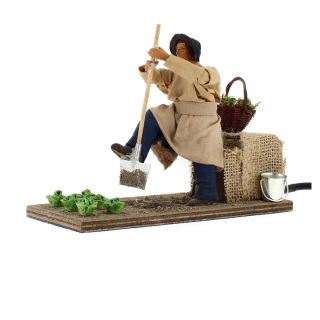 Hombre con pala en movimiento de terracota con traje 12 cm