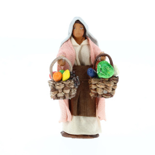 Woman with two baskets of fruit in hands in dressed terracotta 7 cm