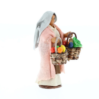 Woman with two baskets of fruit in hands in dressed terracotta 7 cm