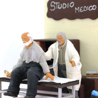 Medico curante statua a movimento in terracotta vestita 12 cm